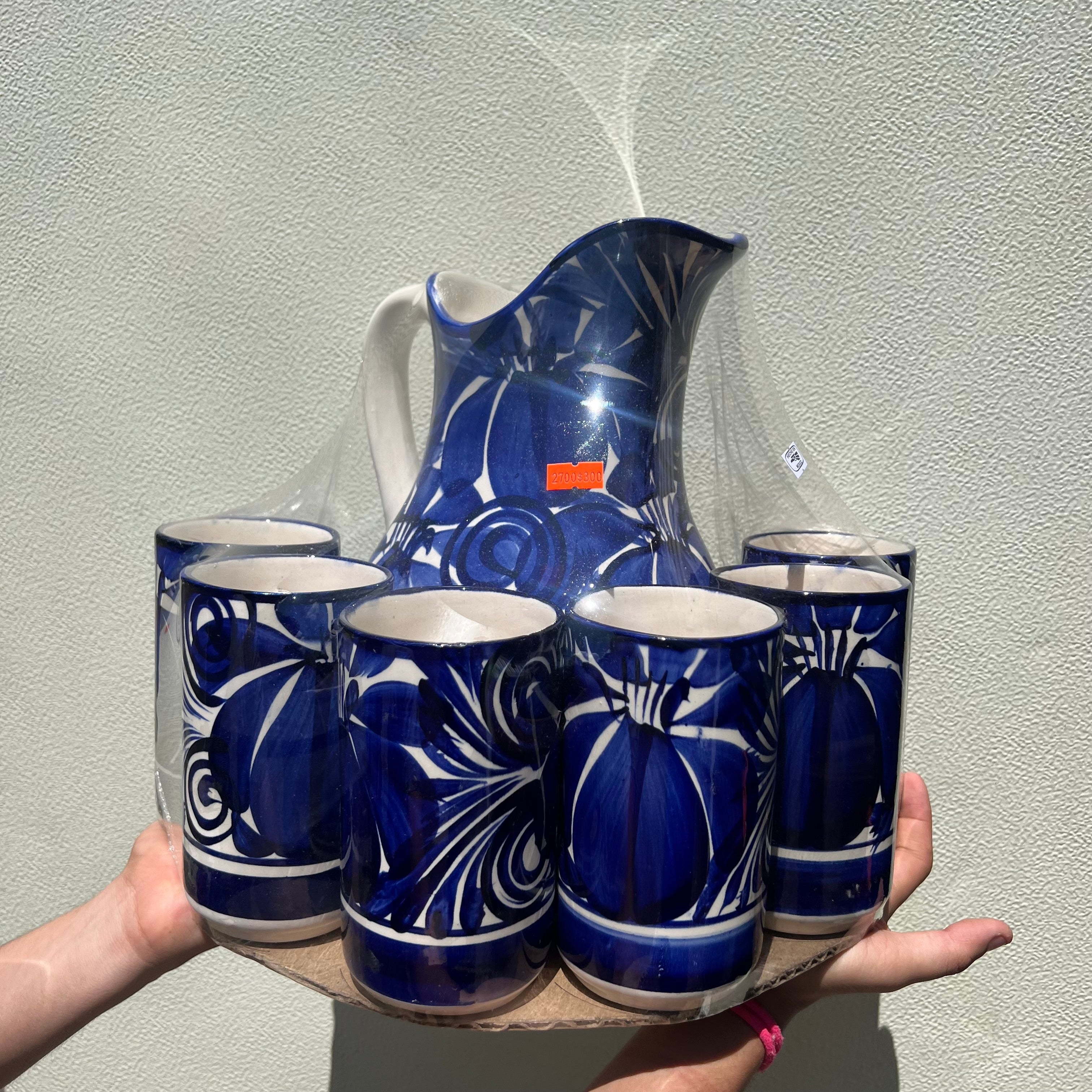 Juego de jarra y tazas de cerámica azul