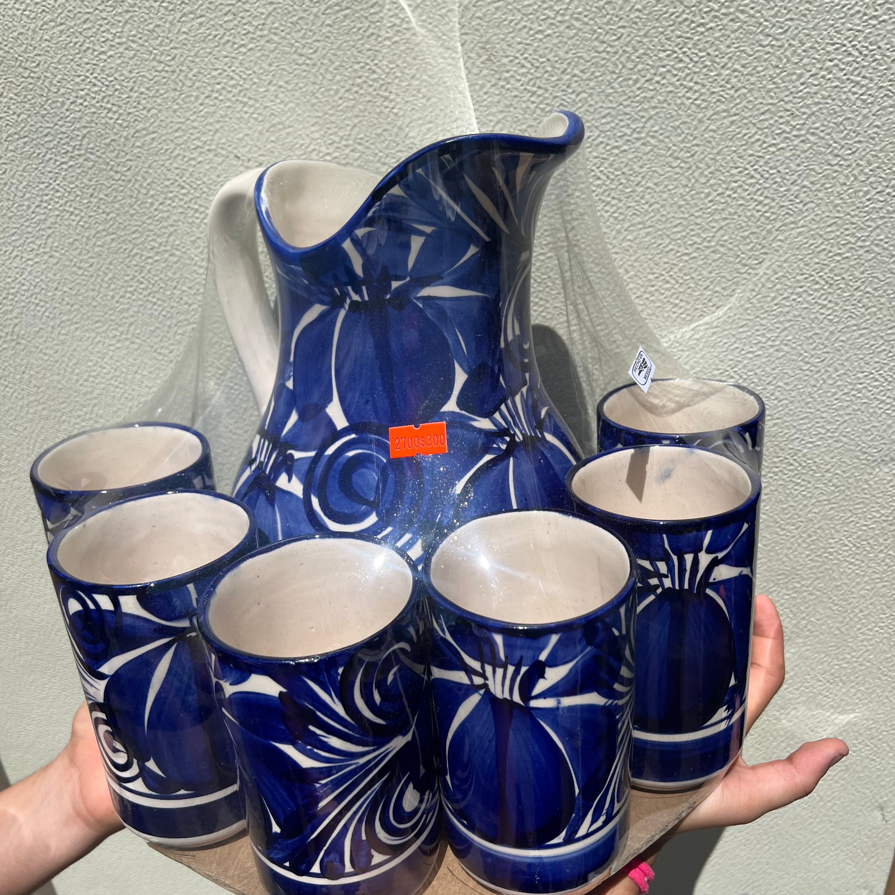 Juego de jarra y tazas de cerámica azul