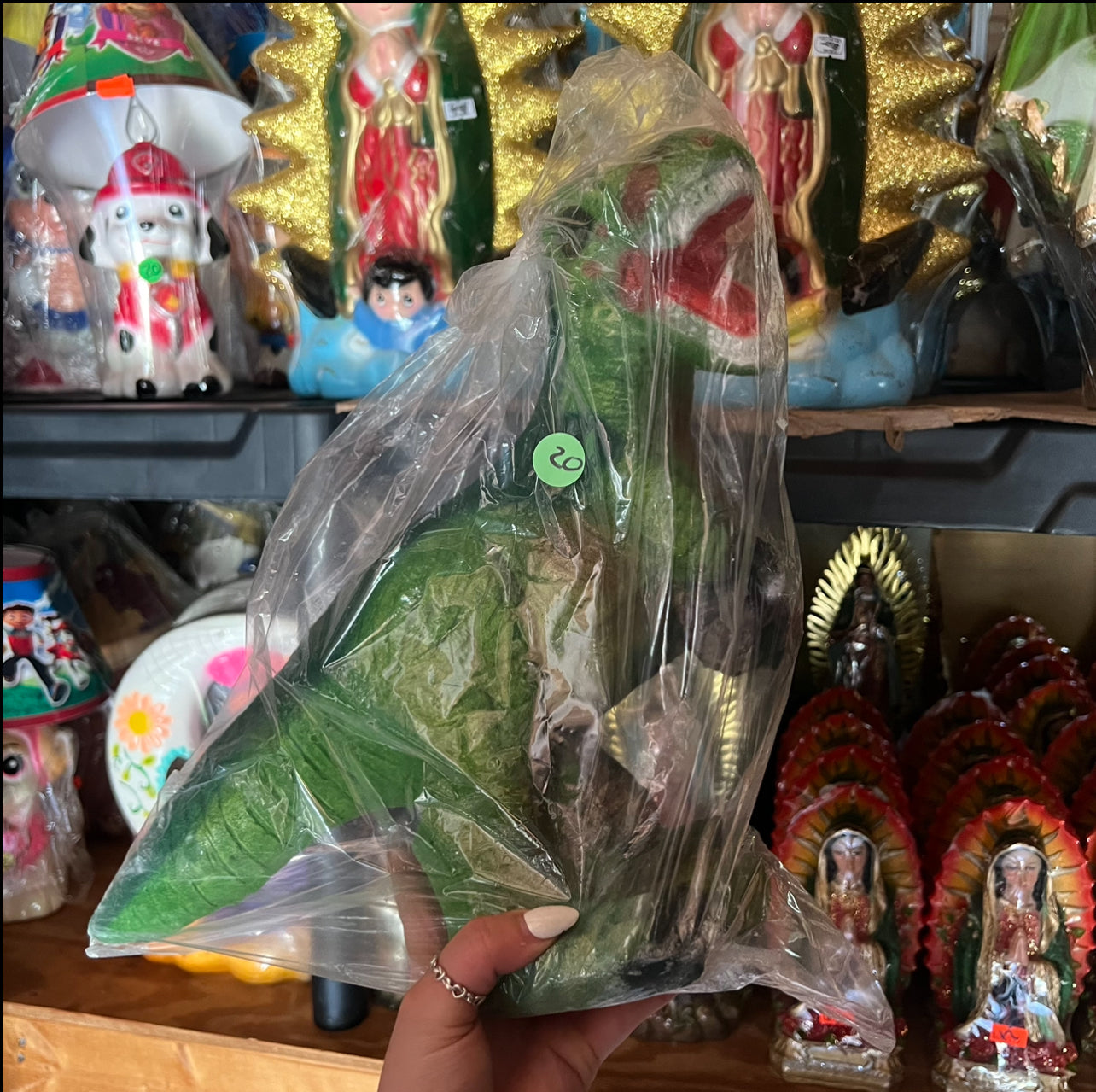 Hucha de dinosaurio roja y verde