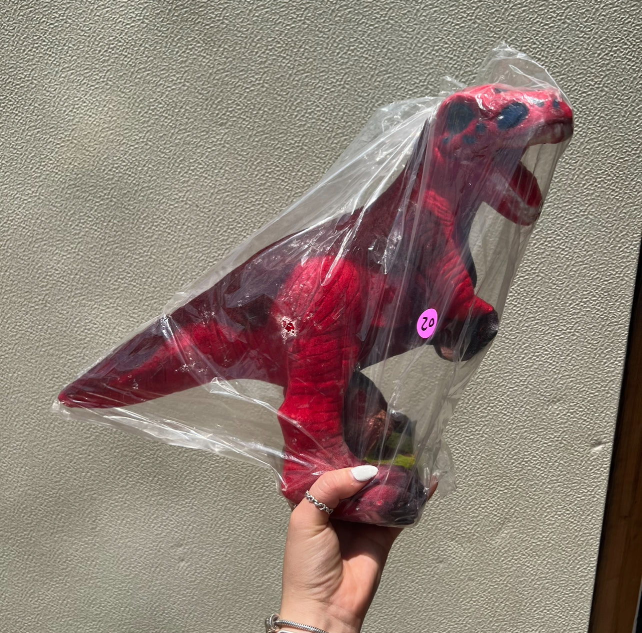 Hucha de dinosaurio roja y verde