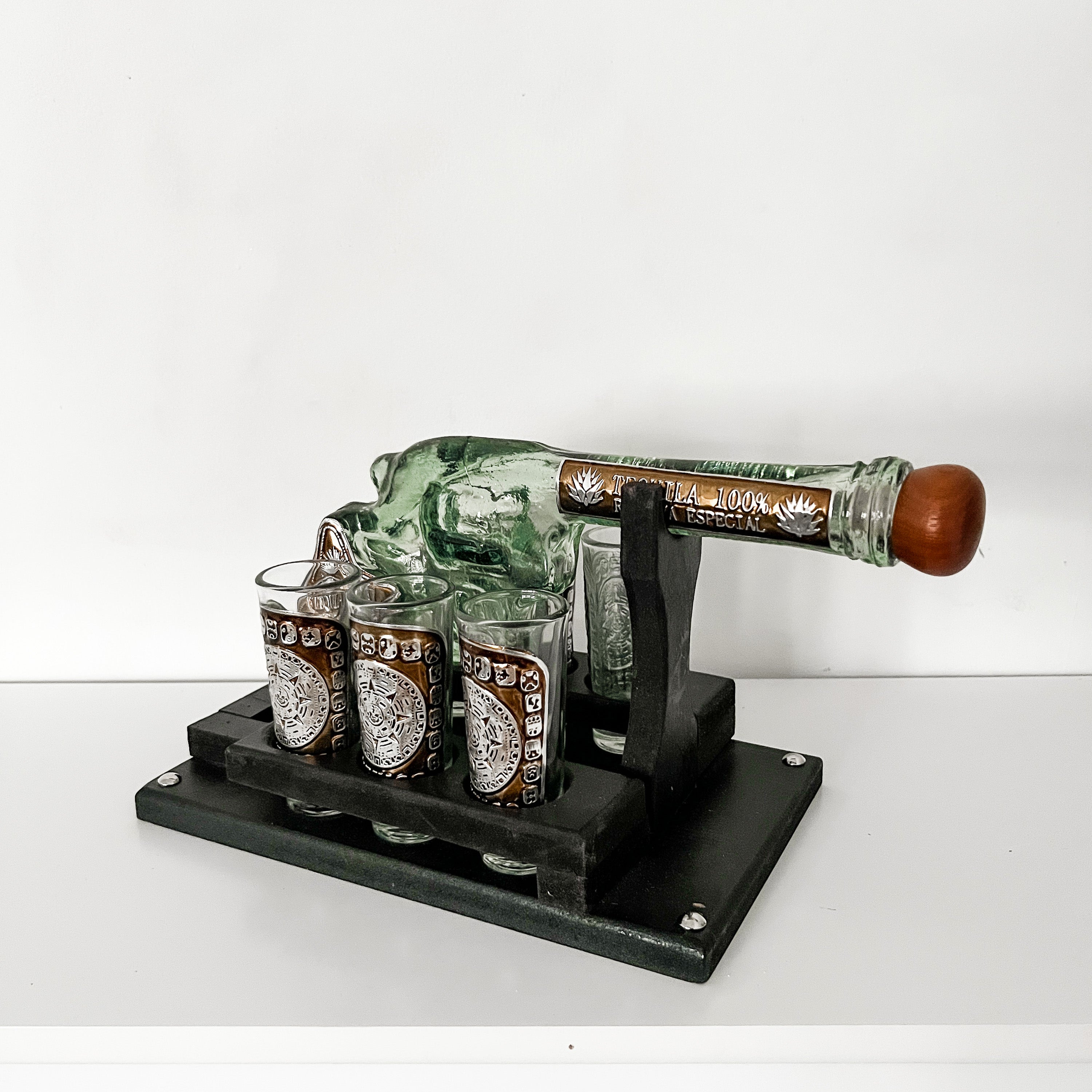 Shot glass in the shape of a gun