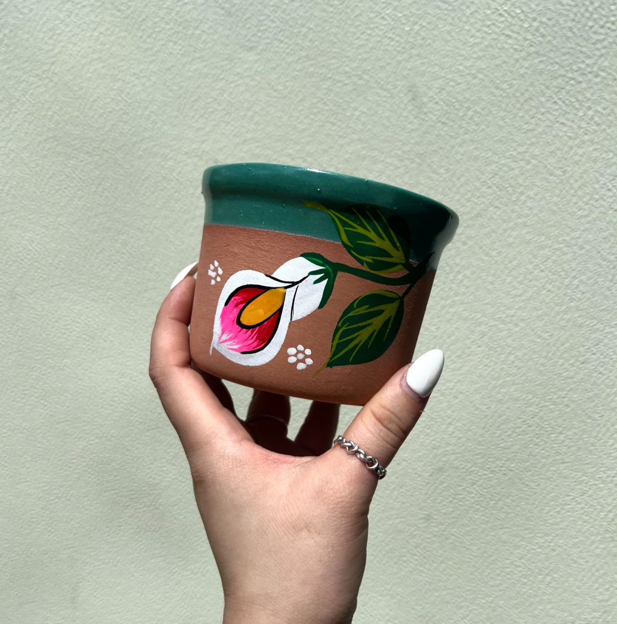 Jarra hervidor de agua con taza