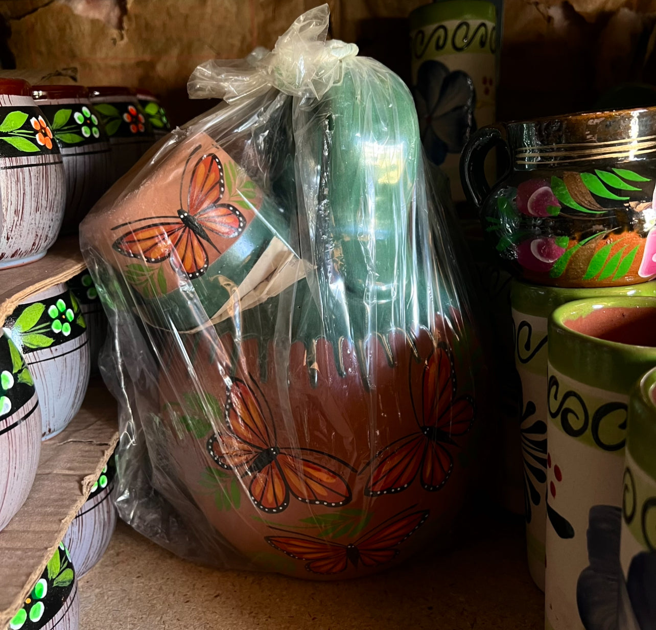 Jarra hervidor de agua con taza