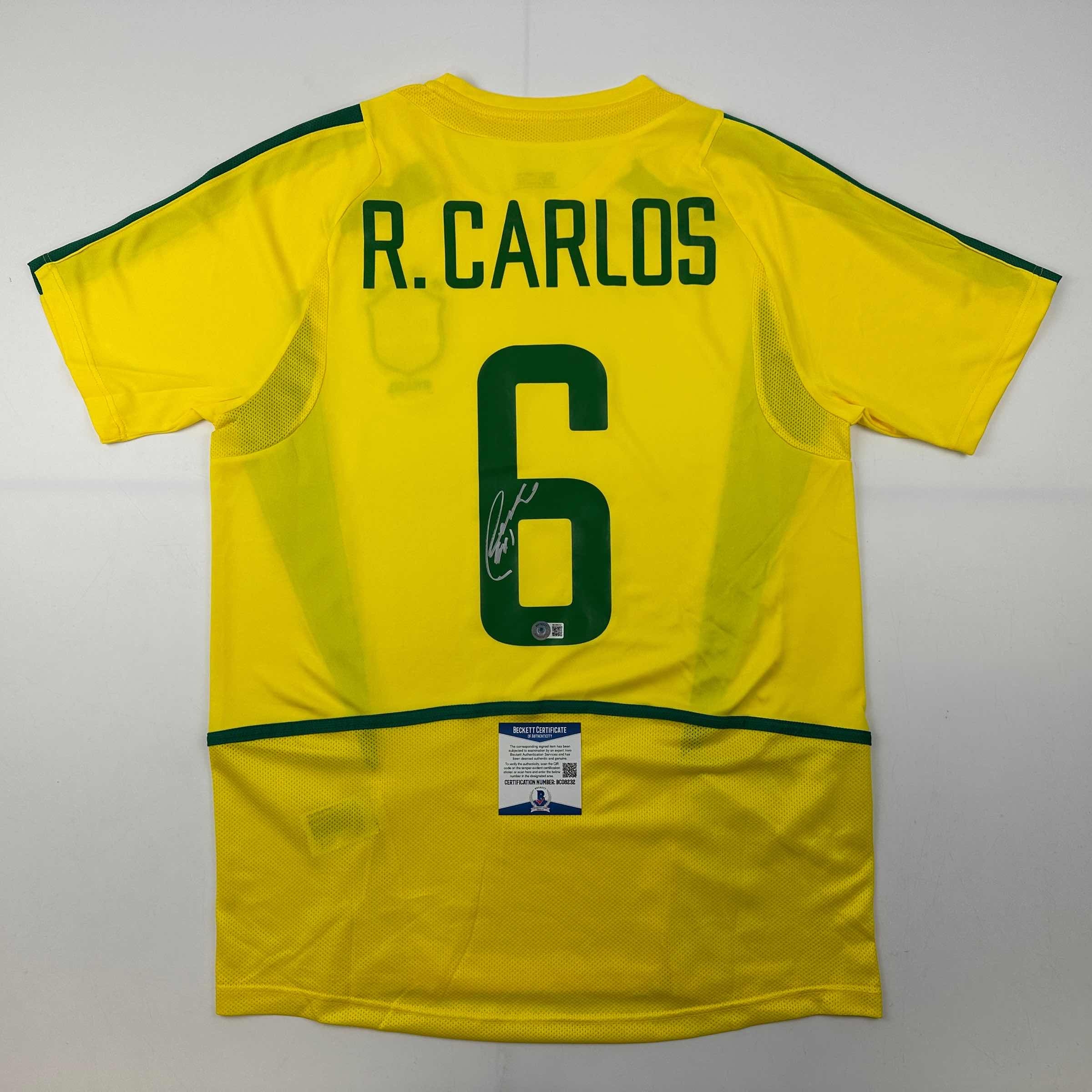 Camiseta de fútbol amarilla de Brasil autografiada/firmada por Roberto Carlos Beckett BAS COA