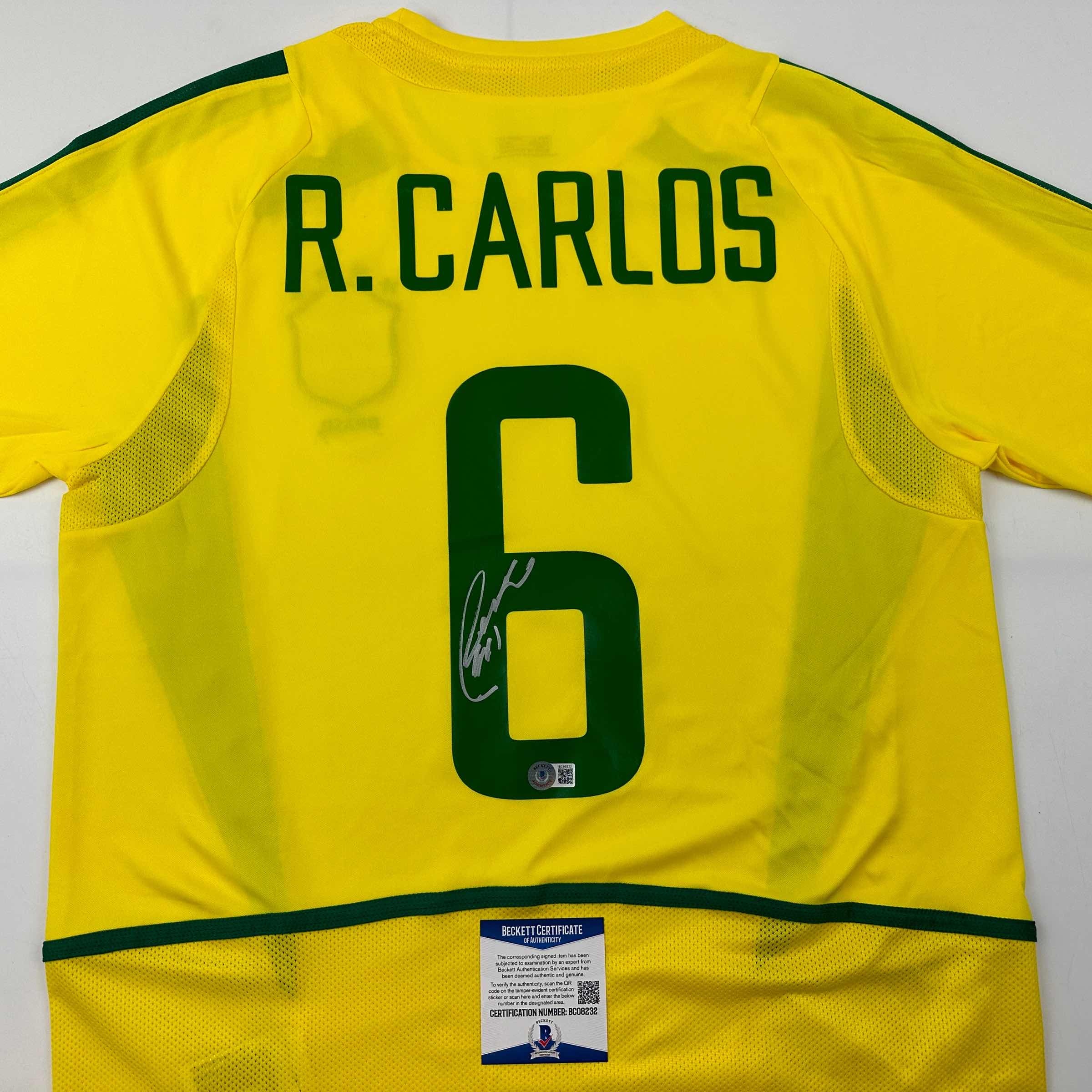 Camiseta de fútbol amarilla de Brasil autografiada/firmada por Roberto Carlos Beckett BAS COA