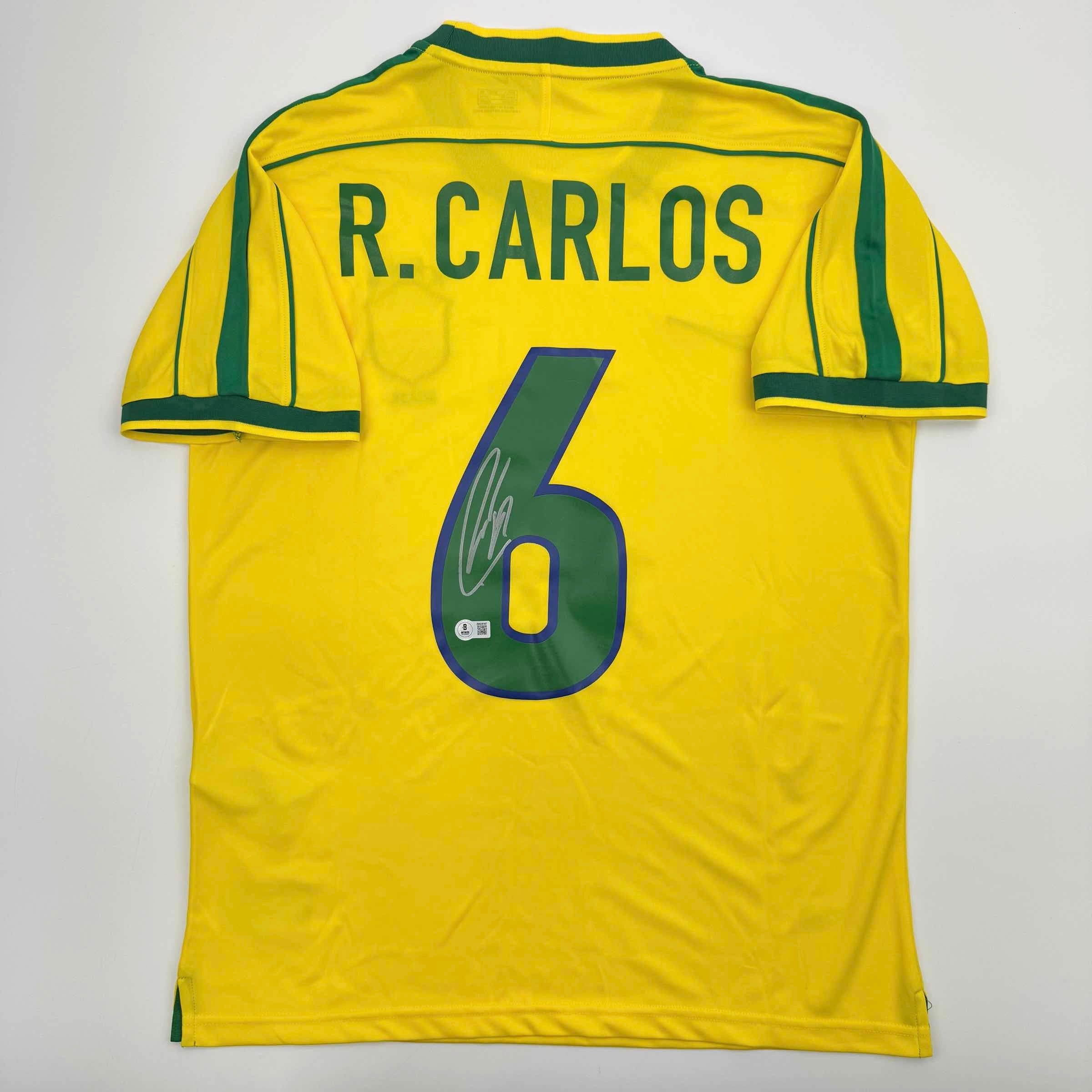 Camiseta de fútbol amarilla de Brasil autografiada/firmada por Roberto Carlos Beckett BAS COA