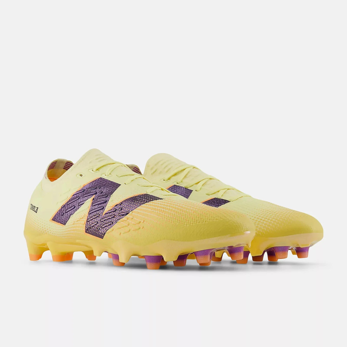 New Balance Tekela Pro Low Laced V4+ 2E Wide Firm Ground Soccer Cleats - Energy Rush Pack (SP25)